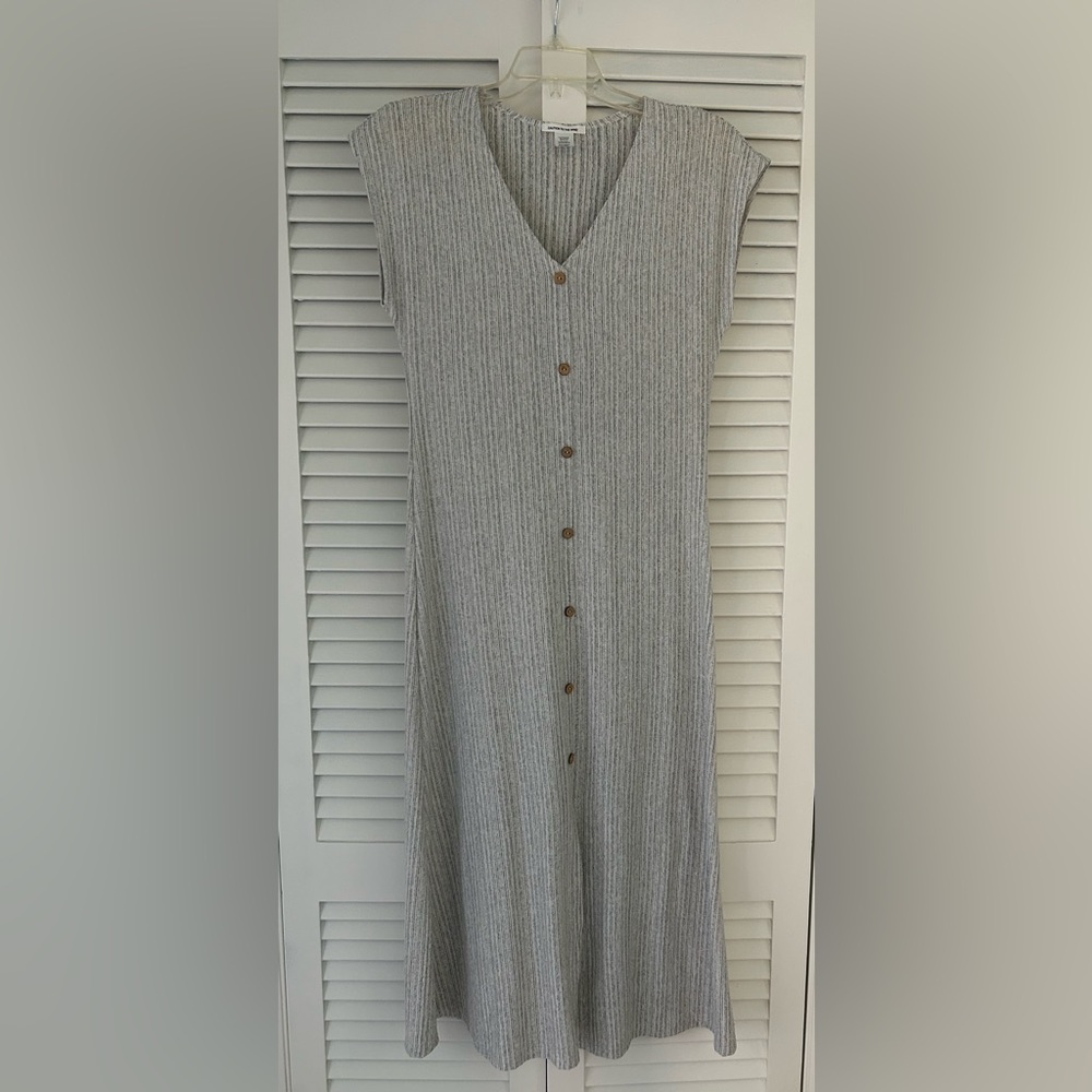 Woman’s size L dress.  Creamy white background with black and grey flecks.